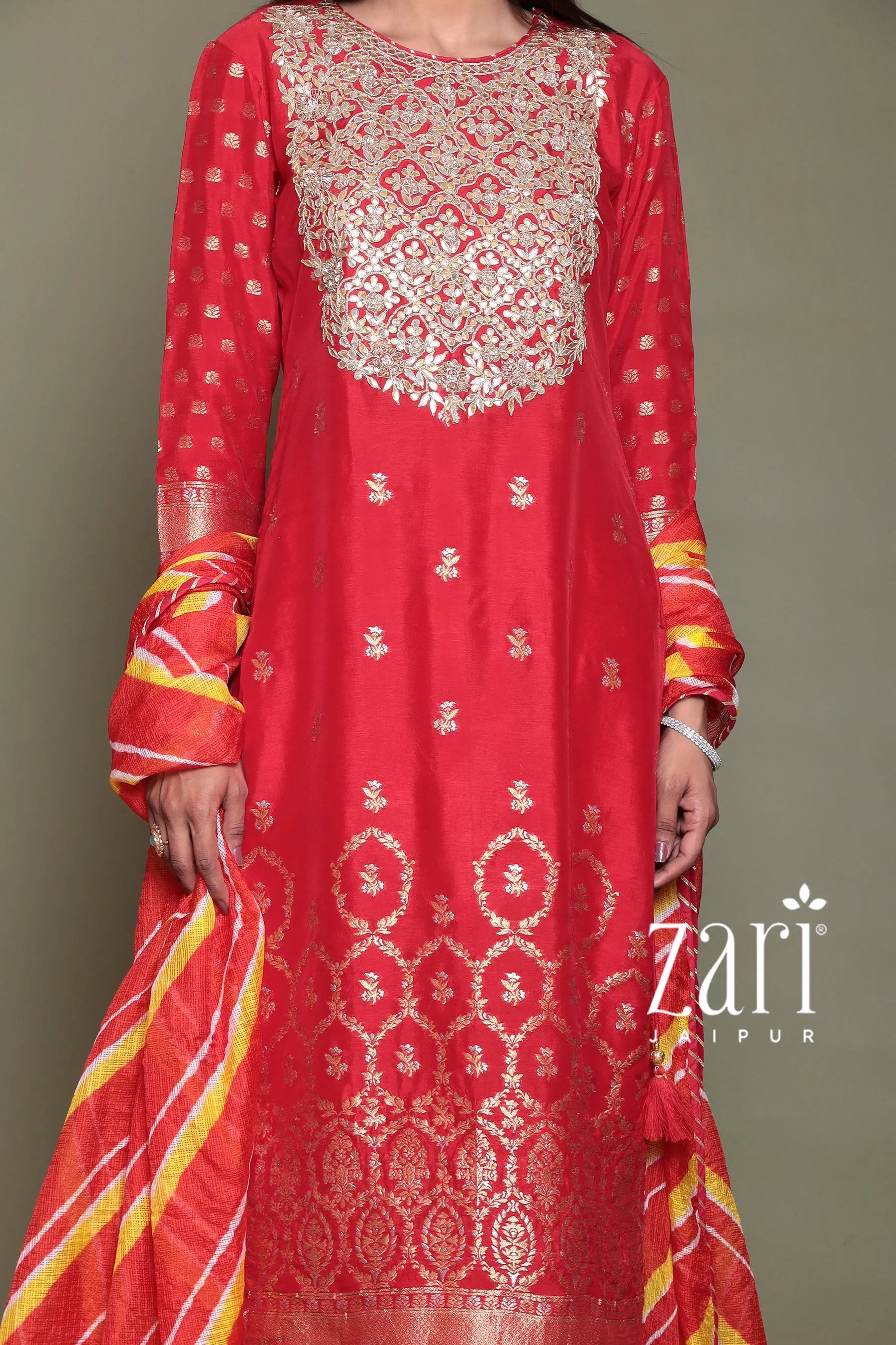 Banarasi Silk Suit with Aari, Gota Patti, Pearl, Zardozi work.