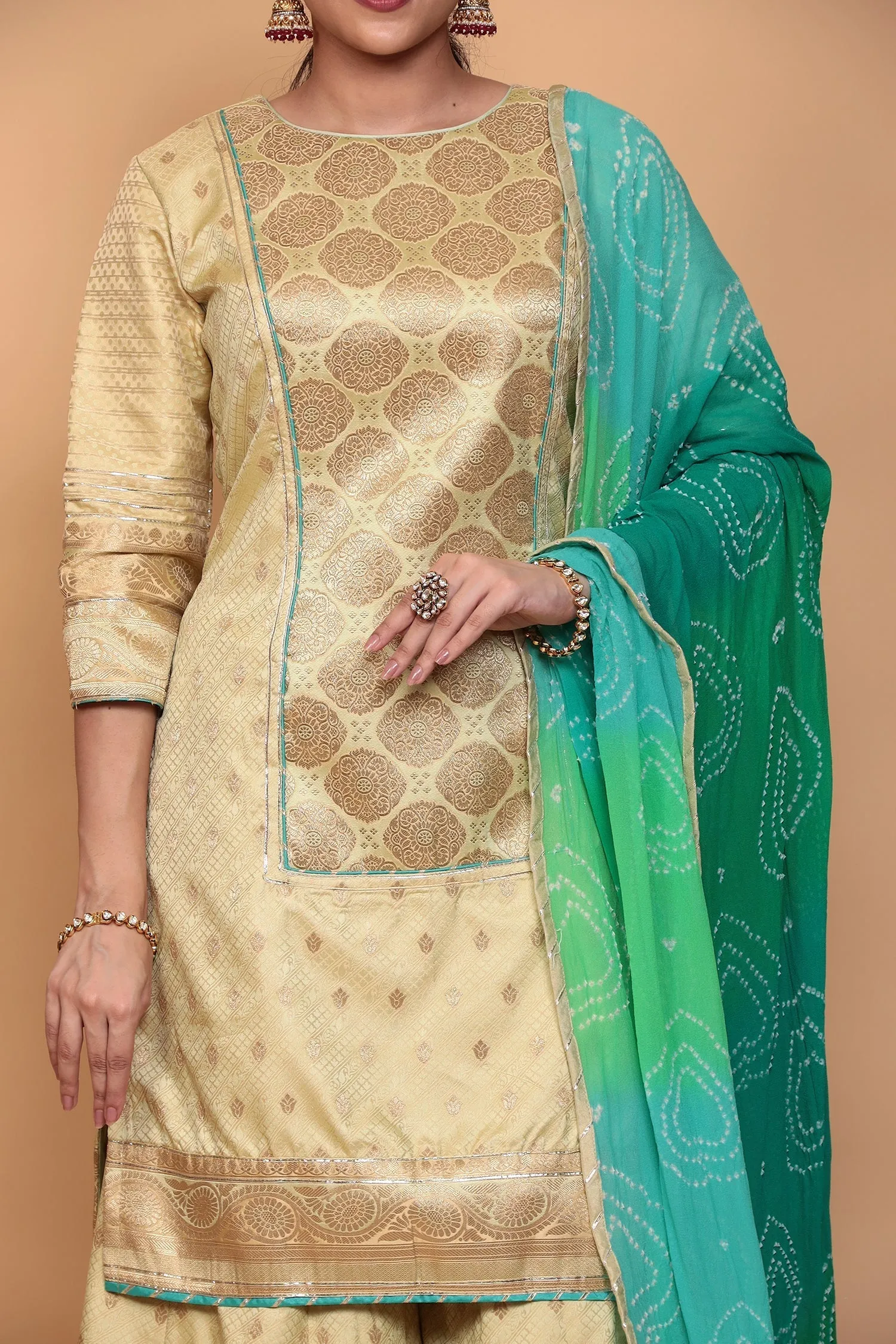 Banarasi Silk Suit with Gota work.