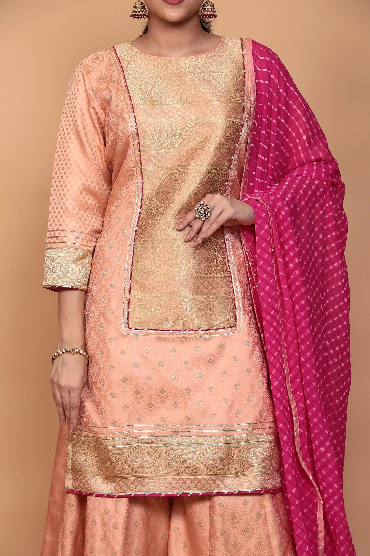 Banarasi Silk Suit with Gota work.