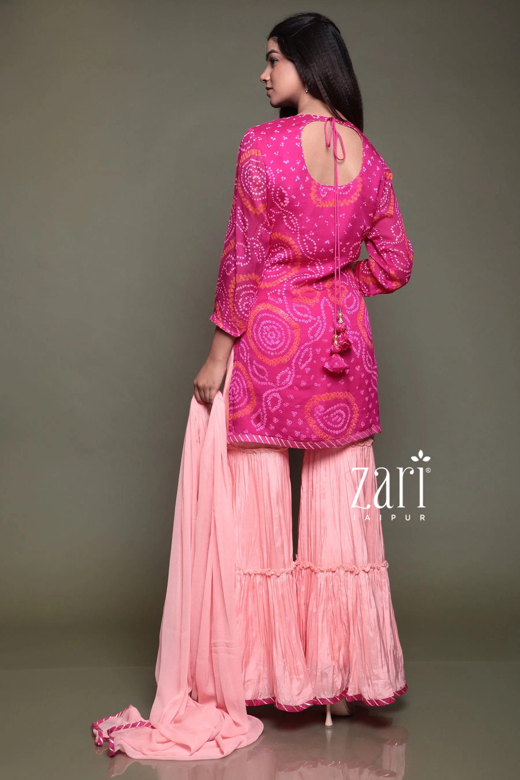 Bandhej Chinon silk Suit with Aari, Gota Patti, Pearl, Sequins, Thread, Zardozi work.