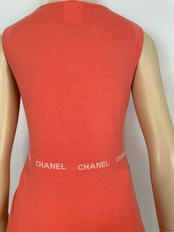 Chanel 04P, 2004 Spring Salmon/Orange Sleeveless sweater “Chanel" 8 times in design FR 42 US 8